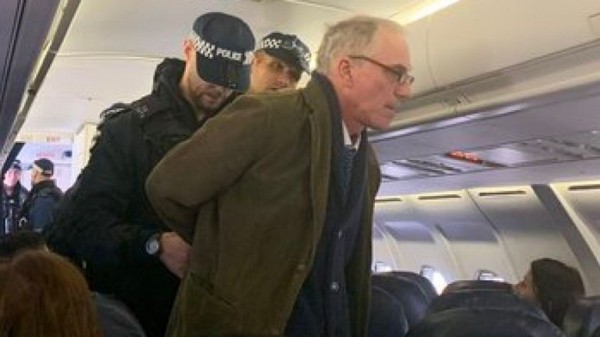 Extinction Rebellion protester climbs on plane at London City Airport
Extinction Rebellion protester climbs on plane at London City Airport