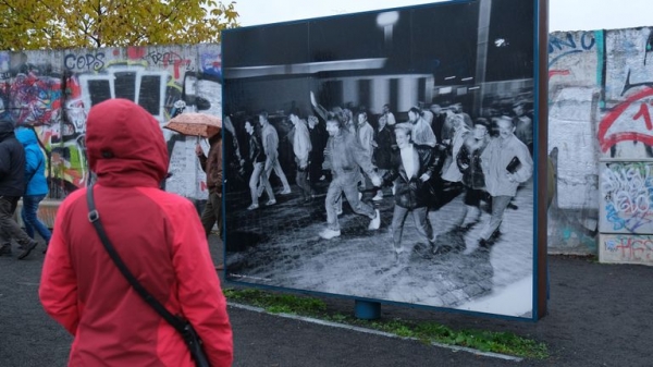
                              No wall too high to be broken down, says Angela Merkel on Berlin Wall anniversary
                      
