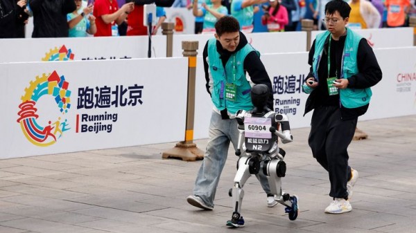 China hosts world's first half-marathon race between humans and robots China hosts world's first half-marathon race between humans and robots