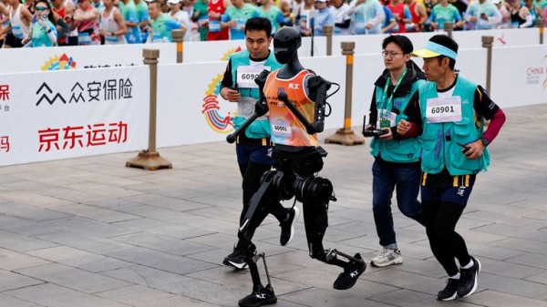 China hosts world's first half-marathon race between humans and robots China hosts world's first half-marathon race between humans and robots