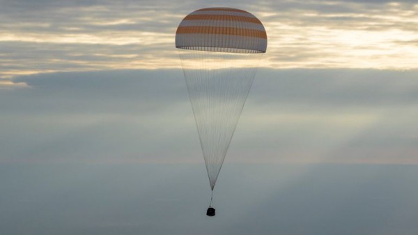 Oldest serving US astronaut returns from space on 70th birthday