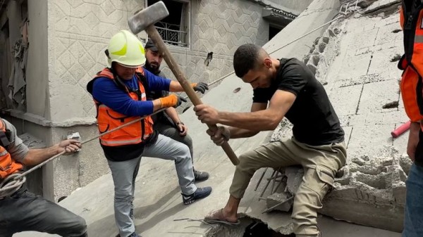 Palestinian man forced to abandon loved ones trapped beneath rubble after IDF warning