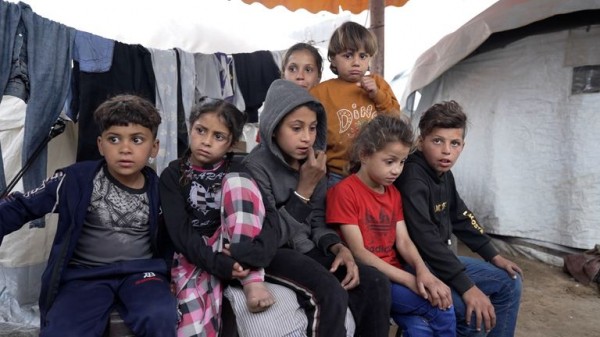 Palestinian man forced to abandon loved ones trapped beneath rubble after IDF warning