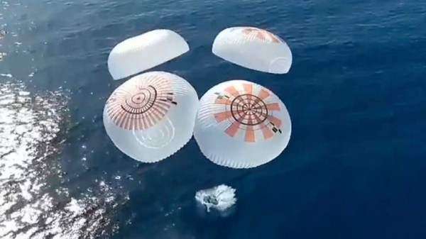 SpaceX tourists return to Earth after historic flight SpaceX tourists return to Earth after historic flight