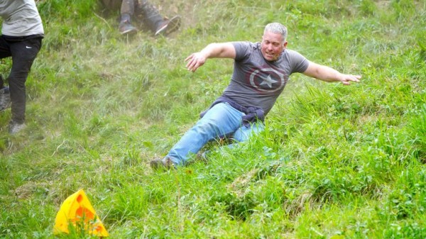 Cheese-loving daredevils hurl themselves down Cooper's Hill in Gloucestershire for famous race Cheese-loving daredevils hurl themselves down Cooper's Hill in Gloucestershire for famous race