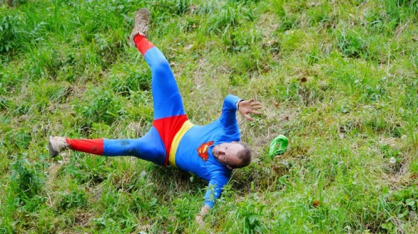 Cheese-loving daredevils hurl themselves down Cooper's Hill in Gloucestershire for famous race Cheese-loving daredevils hurl themselves down Cooper's Hill in Gloucestershire for famous race