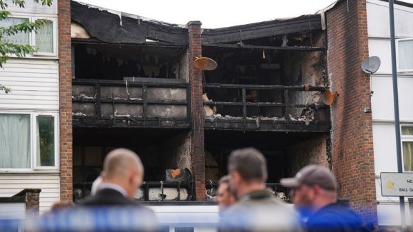 Man arrested on suspicion of murder as three children and a woman die in house fire Man arrested on suspicion of murder as three children and a woman die in house fire