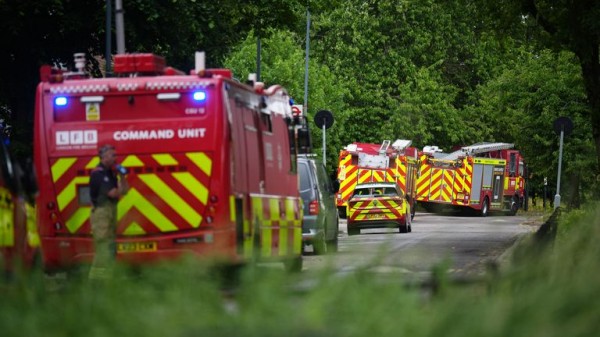 Man arrested on suspicion of murder as three children and a woman die in house fire Man arrested on suspicion of murder as three children and a woman die in house fire