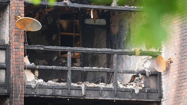 Man arrested on suspicion of murder as three children and a woman die in house fire Man arrested on suspicion of murder as three children and a woman die in house fire