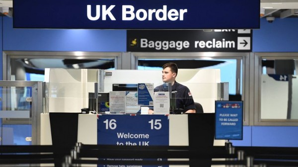 Net migration halves in UK, new data shows Net migration halves in UK, new data shows