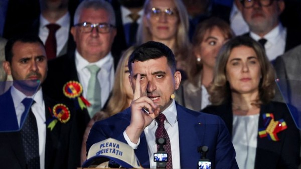 Nicusor Dan beats hard-right favourite George Simion in Romanian election