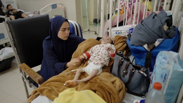 Palestinians flock to Gaza aid centres despite concerns - as lawyers call for sanctions on Israel Palestinians flock to Gaza aid centres despite concerns - as lawyers call for sanctions on Israel