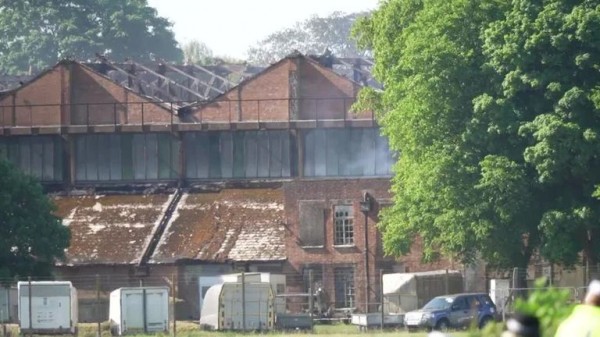 Two firefighters and one other person die after fire at former RAF base in Oxfordshire