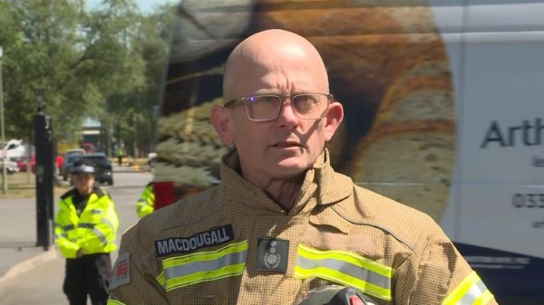 Two firefighters and one other person die after fire at former RAF base in Oxfordshire