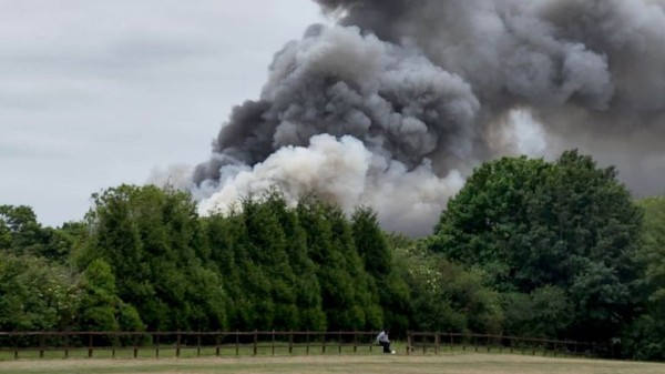 Two firefighters and one other person die after fire at former RAF base in Oxfordshire
