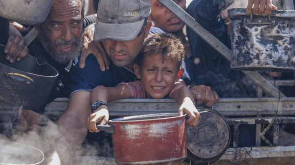 Children 'eating out of piles of garbage' as Gaza aid trickles in Children 'eating out of piles of garbage' as Gaza aid trickles in