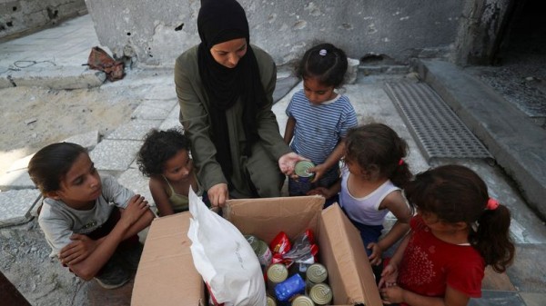 Children 'eating out of piles of garbage' as Gaza aid trickles in Children 'eating out of piles of garbage' as Gaza aid trickles in