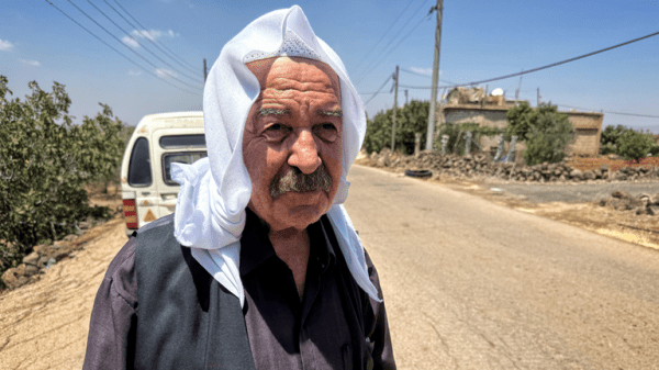 Homes still burning after mass pillaging and 30,000 trapped in besieged city - as Syria's fragile ceasefire holds Homes still burning after mass pillaging and 30,000 trapped in besieged city - as Syria's fragile ceasefire holds