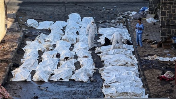Rows of decomposing bodies that haven't been buried because of fierce fighting in Syrian city Rows of decomposing bodies that haven't been buried because of fierce fighting in Syrian city